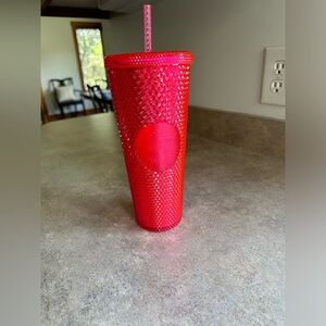 Pink studded Starbucks Cup